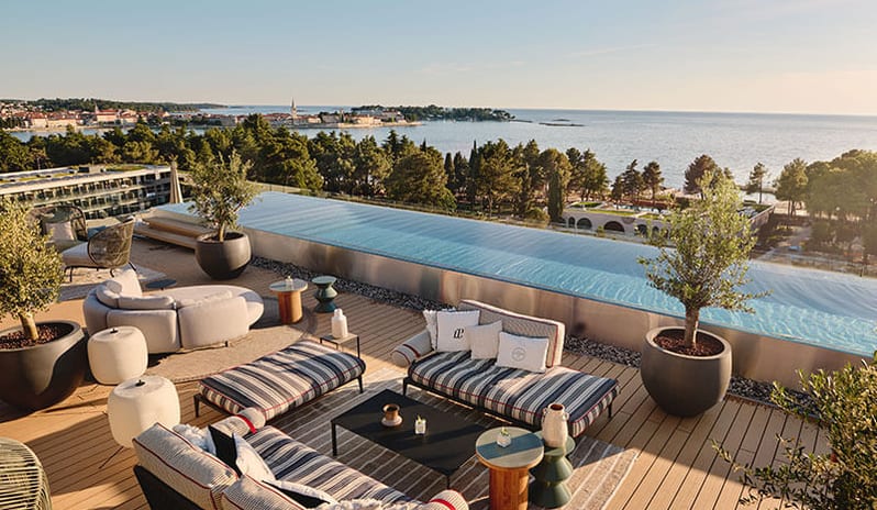 Pical rooftop bar by Laurent Perrier shimmering Outdoor rooftop lounge and infinity pool terrace with sea view at Pical Resort, Valamar Collection by Kenwood Travel