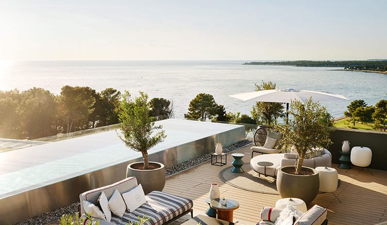 Pical rooftop bar by Laurent Perrier shimmering Outdoor rooftop lounge and infinity pool terrace with sea view at Pical Resort, Valamar Collection by Kenwood Travel