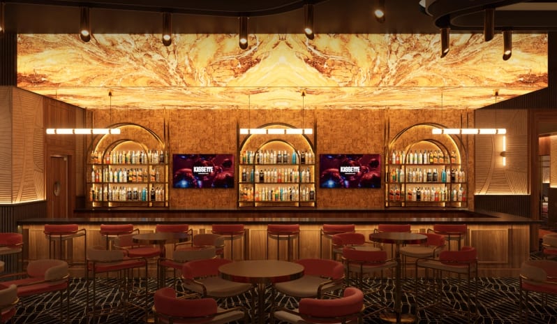 Kassette Modern bar lounge interior with backlit marble ceiling and coral seating at Moon Palace The Grand Punta Cana by Kenwood Travel