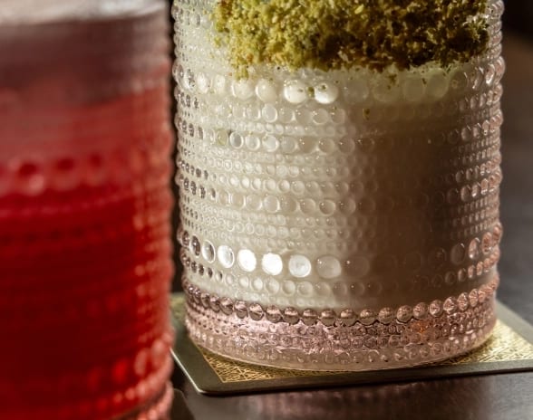 Habibi Creamy mint cocktail with crushed pistachio rim in textured glassware at Moon Palace The Grand Punta Cana by Kenwood Travel