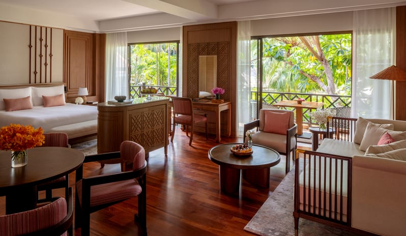 Club Two Bedroom Family Suite Full view of the open-plan living area and bed with garden balcony at Anantara Hua Hin Resort  by Kenwood Travel