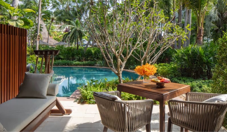 Deluxe Pool Access outdoor seating, daybed, and direct access to the swimming pool at Anantara Hua Hin Resort  by Kenwood Travel