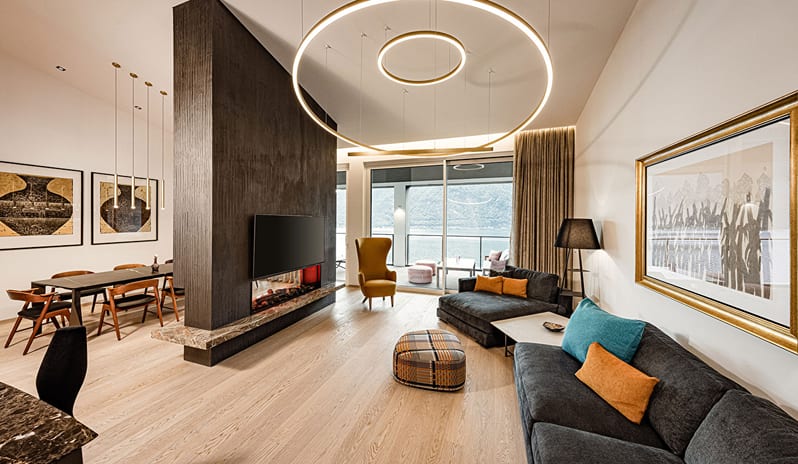 Iconic Aria Penthouse Suite Modern open-plan living and dining area at ARIA Retreat & SPA by Kenwood Travel