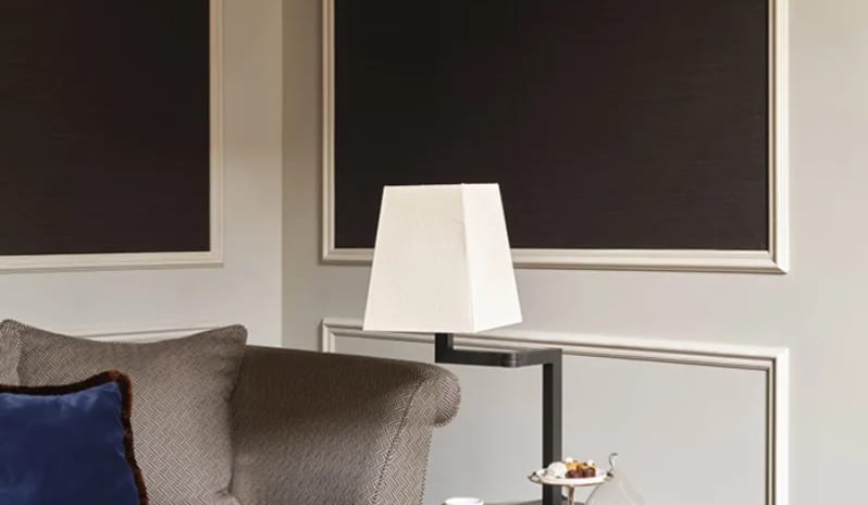 Deluxe Double Room living area corner featuring stylish furniture, side table with coffee, and modern lightingat Palazzo Venezia by Kenwood Travel