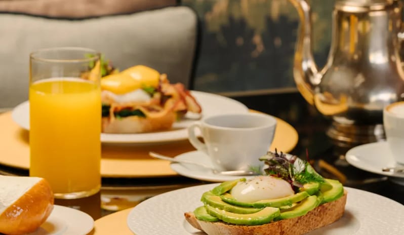 Altariva Restaurant Avocado toast with poached egg, orange juice, and hot coffee served for breakfast at Palazzo Venezia by Kenwood Travel