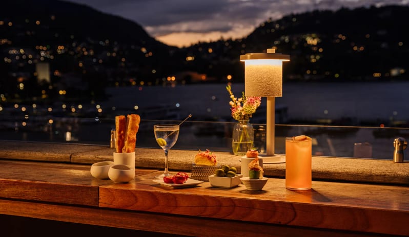 Altariva Bar Evening cocktails and gourmet snacks served on the outdoor railing table at Palazzo Venezia by Kenwood Travel