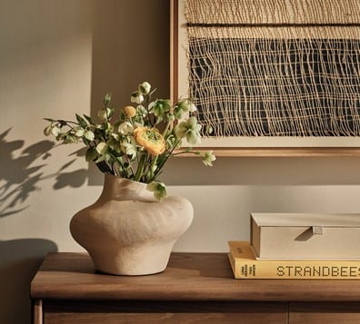 Superior Double Pool View Organic ceramic vase with flowers on a wooden sideboard Ikos Olivia by Kenwood Travel