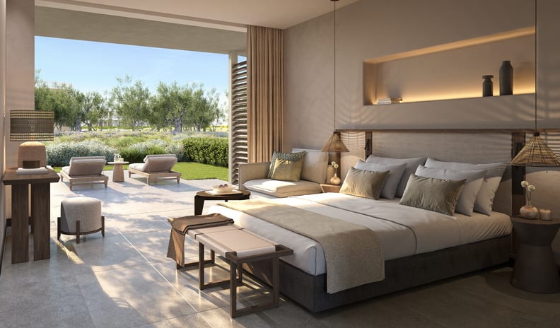 Superior Double Room Private Garden Pool View Minimalist earthy bedroom design featuring neutral tones, woven pendant light fixtures, and an outdoor terrace with sun loungers at Ikos Kissamos by Kenwood Travel