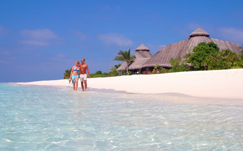 Kuredu Island Resort & Spa-Walking on beach.jpg