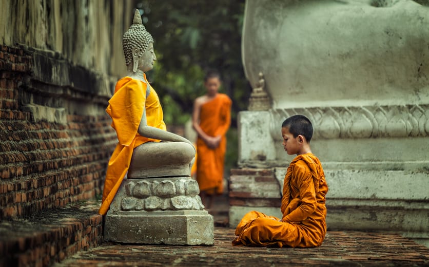  Novices monk vipassana meditation at front of Buddha statue.jpg
