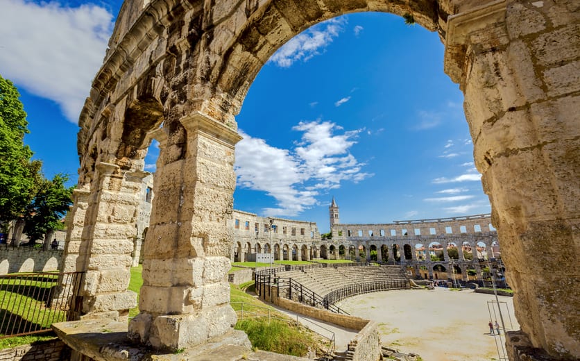shutterstock_644169721 - A wall fragment of ancient Roman amphitheater (Arena) in Pula, Croatia.jpg