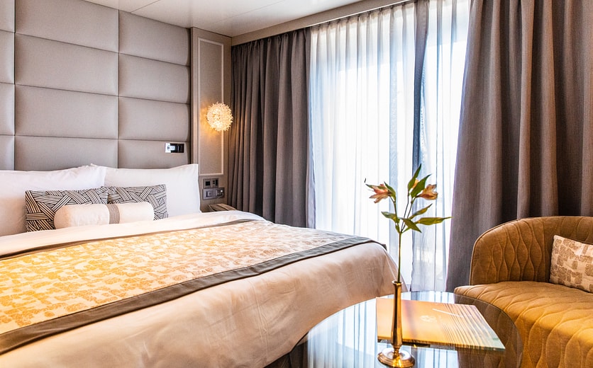 Crystal Cruises SYMPHONY Aquamarine Veranda Suite Bedrom.jpg