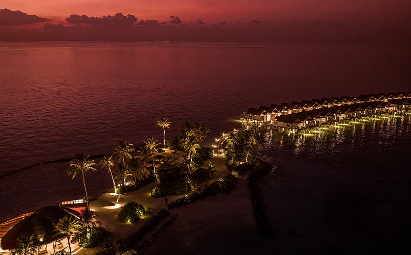 OBLU SELECT Lobigili - Full Island Aerial - Sunset - 01.jpg