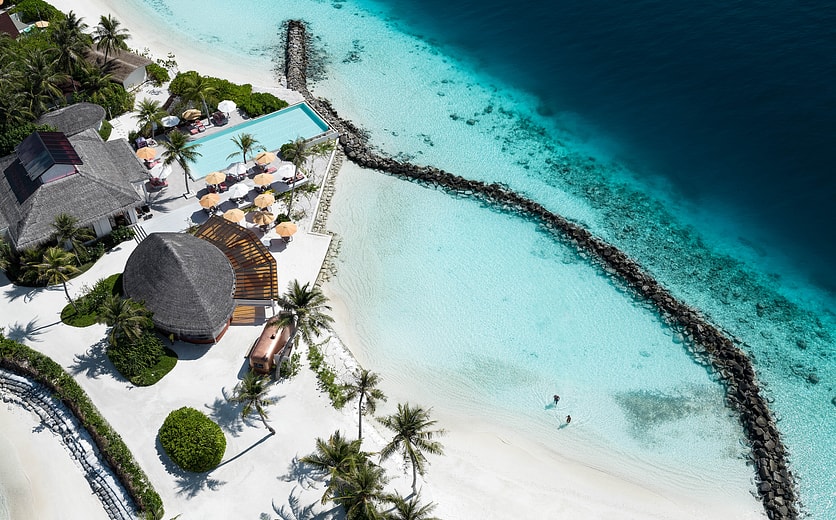 OBLU SELECT Lobigili - Full Island Aerial - Swing Bar Pool Beach.jpg