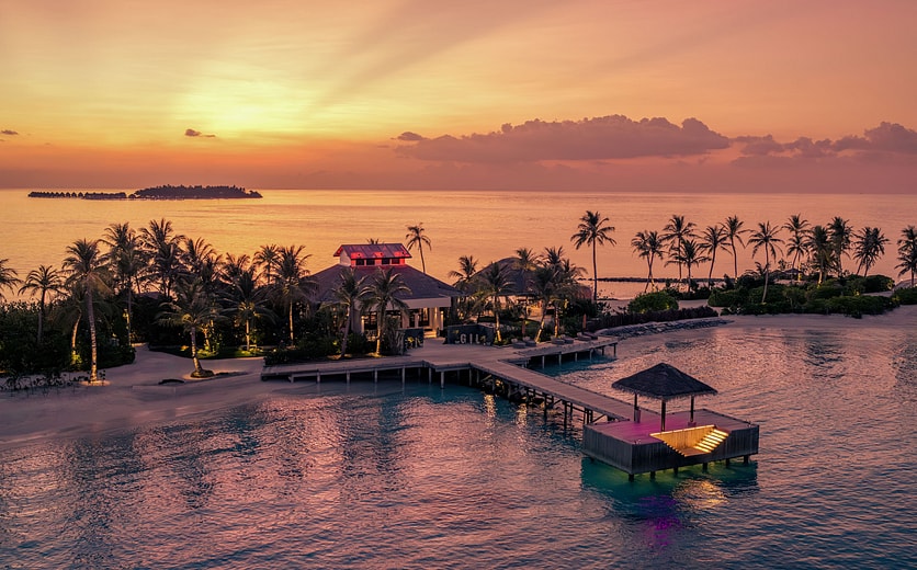 OBLU SELECT Lobigili - Island Aerial Sunset - Arrival Jetty 01.jpg